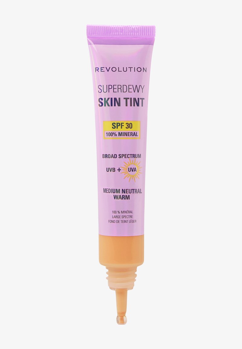 Revolution Beauty Superdewy SPF30 Skin Tint makeup product with a smooth, dewy finish in a compact form.