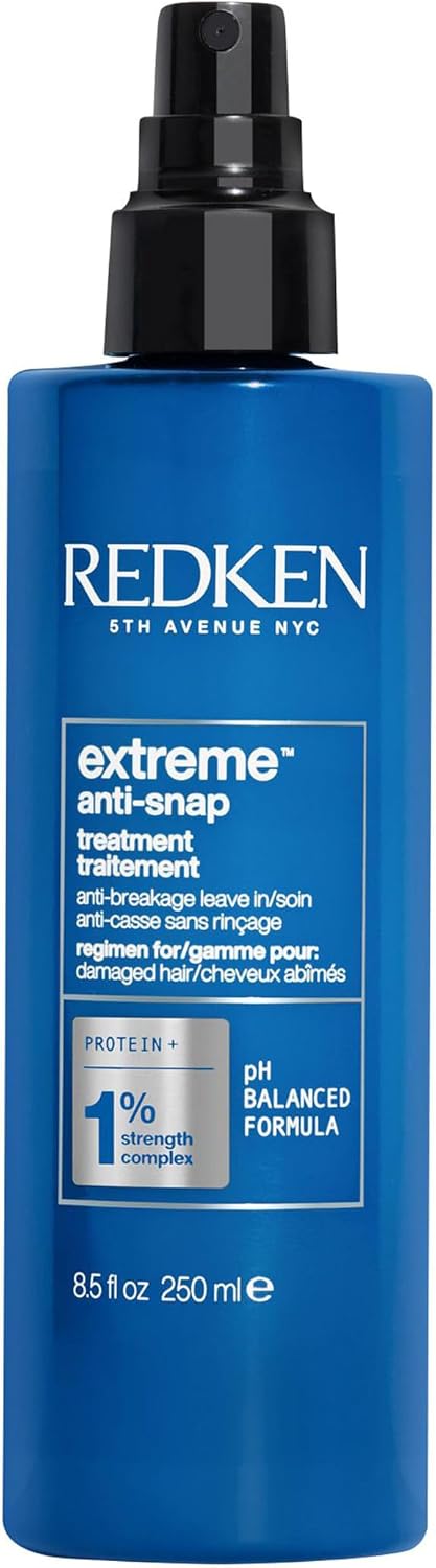 Redken Extreme Anti-Snap leave-in treatment in 250ml bottle, nourishing hair treatment with serum and oil properties.