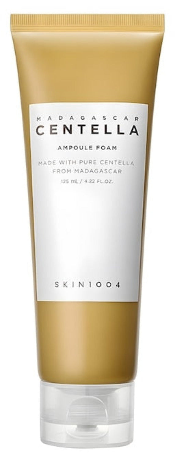 SKIN1004 Madagascar Centella Ampoule Foam bottle, K-Beauty skincare product, with white and green packaging and pump dispenser.