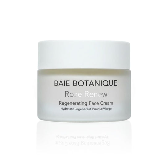 Baie Botanique Organic Rose Renew Face Cream jar showing the cream's smooth texture and elegant packaging for skincare.