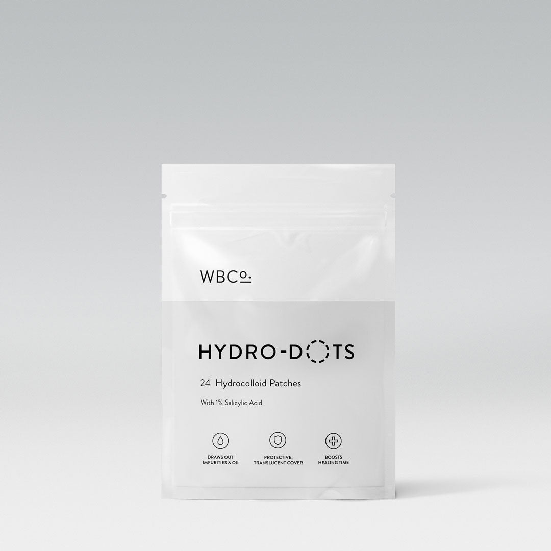 Refined Medical Aesthetics Hydro-Dots skincare product in grey packaging, close-up shot highlighting the design and branding.
