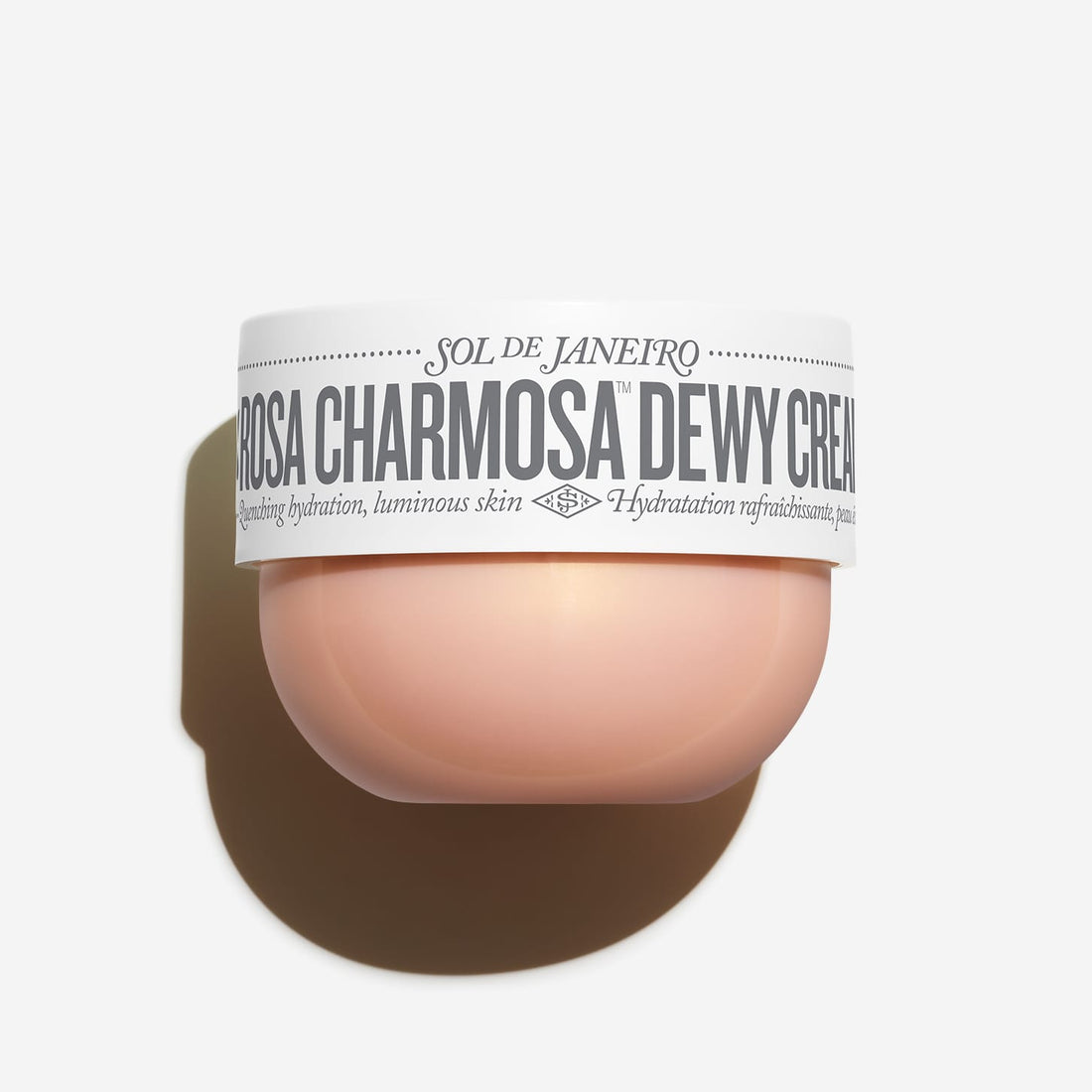 Sol de Janeiro Rosa Charmosa Dewy Cream in a 240ml jar, featuring pink and floral packaging for nourishing body care.